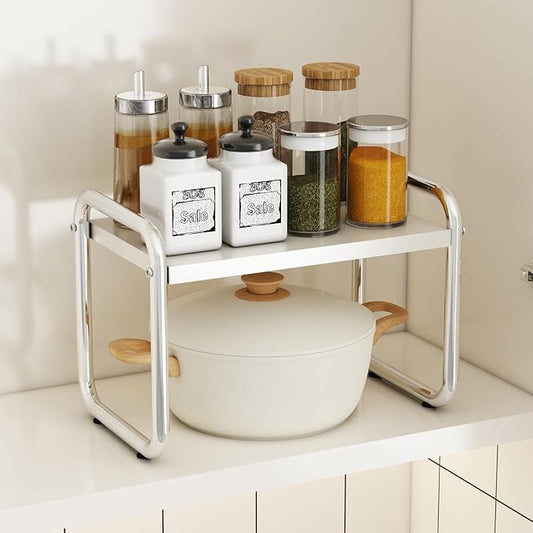 Kitchen cabinets and countertop shelves, storage racks, sinks, pots and utensils, stackable shelves, white