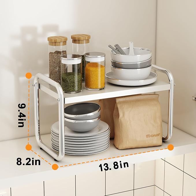 Kitchen cabinets and countertop shelves, storage racks, sinks, pots and utensils, stackable shelves, white