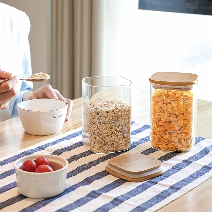 ComSaf Glass Storage Containers with Lids, 37fl.oz Glass Jars with Lids, Clear Food Storage Jar, Glass Canister for Pantry Cookie Flour Cereal Rice Sugar Tea Coffee Beans Spice, Square Set of 4